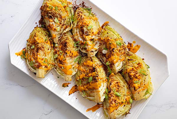 Roasted Cabbage with “Cheesy” Sauce